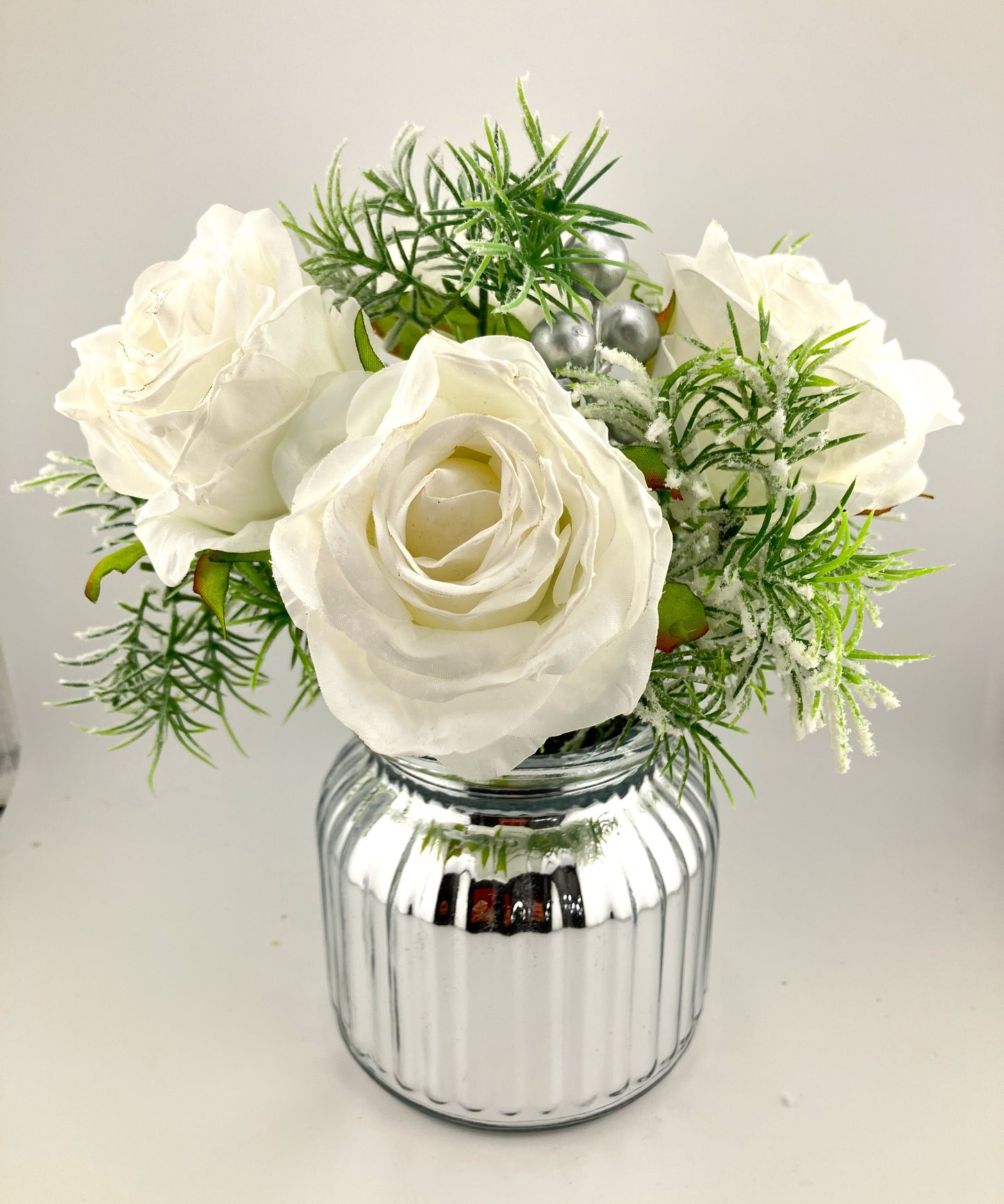 4 White Dried Touch Roses with Trailing Asparagus Bush in Silver Bud Vase